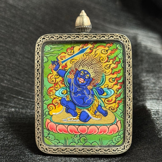 Front view of Acala Vidyaraja Thangka showing Acala Wisdom King in Rebgong Tradition, mini size (3.5 × 4.5 cm), hand-painted with mineral pigments and gold detailing.