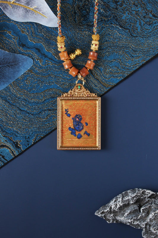 Hand-painted Acalanatha (Fudo Myo-o) mini thangka pendant in Rebgong gold thangka style, featuring mineral pigment artwork, square double-sided titanium steel case, and detailed ornamental bail