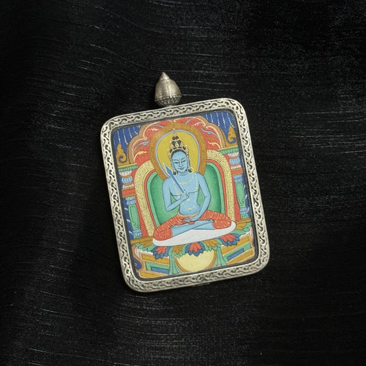 Front view of Akashagarbha Bodhisattva miniature thangka pendant, traditional Tibetan Buddhist hand-painted thangka in silver case