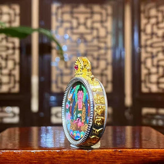 Side view of Amitabha Buddha round Gau pendant showing the polished S925 silver frame, compact circular profile, and fine handcrafted details