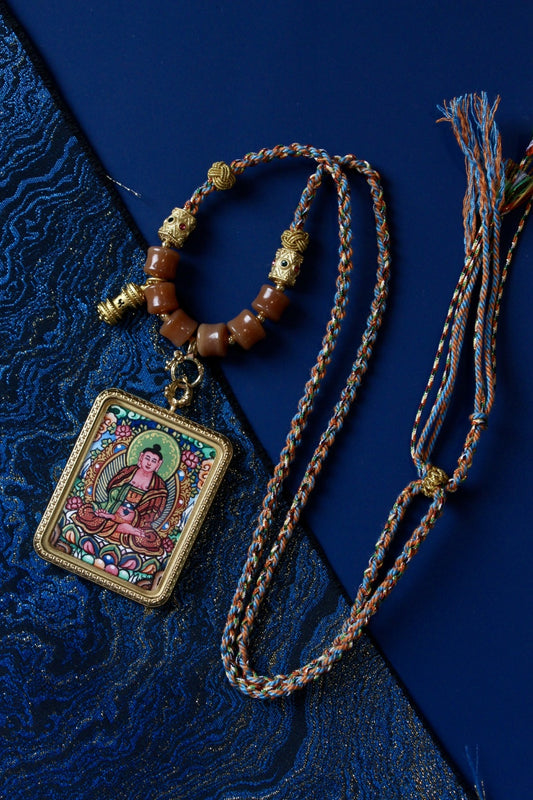 Amitabha Buddha Thangka pendant necklace with braided cord and decorative beads, Tibetan Buddhist amulet for peace, karma purification, and spiritual stability