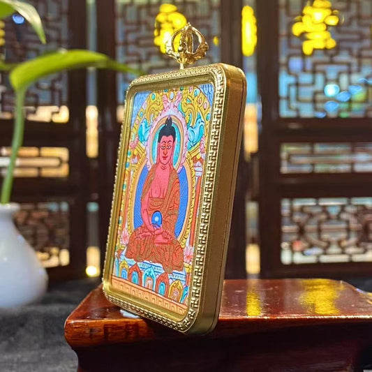 Side view of Amitabha Buddha Gau pendant showing the thick titanium steel frame, large rectangular format, and solid handcrafted construction