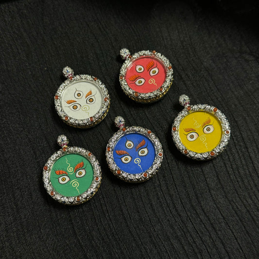 Five Jambhala wealth eye mini thangka pendants showing the five colors of White, Red, Yellow, Blue, and Green representing the five wealth deities, hand-painted with mineral pigments and set in jeweled copper pendant cases.
