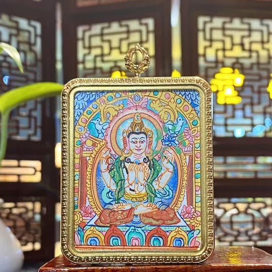 Hand-painted Four-Armed Avalokiteshvara thangka pendant in a titanium steel Ghau box, front view