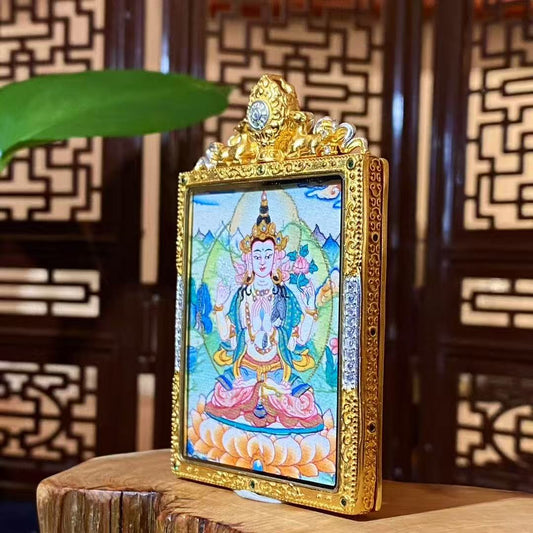Side view of Four-Armed Avalokiteshvara thangka pendant showing the gilded copper Ghau box craftsmanship