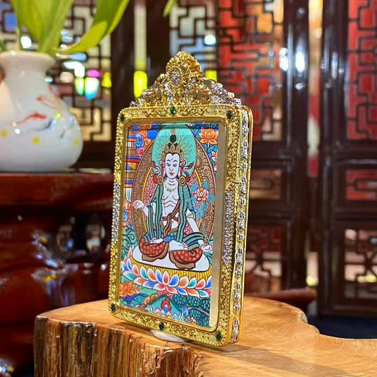 Side detail view of a Mahāsthāmaprāpta Gawu pendant in a gold-plated copper case, showing craftsmanship, depth, and a structured design suitable for daily wear and meditation