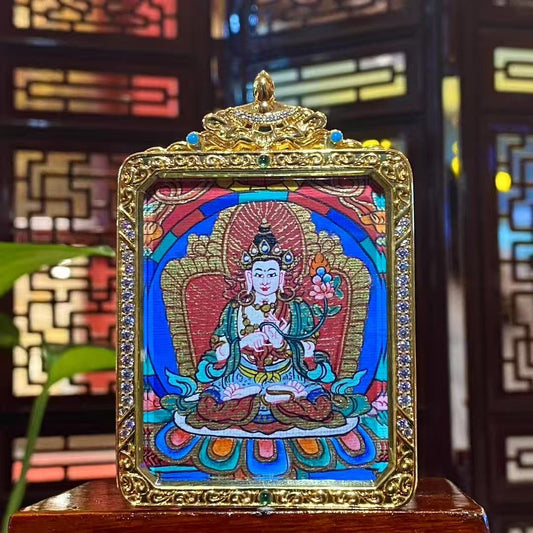 Front view of a double-sided hand-painted Mahāsthāmaprāpta (Great Strength Bodhisattva) Gawu pendant in a gold-plated copper case, symbolizing wisdom light and calm focus