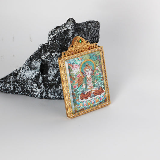 Angled view of Mahasthamaprapta Bodhisattva mini thangka pendant showing the jeweled gold-tone frame and double-sided titanium steel protective case.