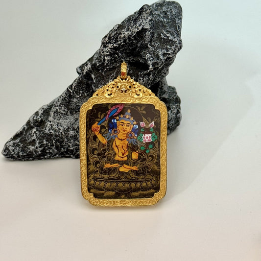 Front view of Manjushri Bodhisattva mini thangka pendant showing black gold background, gold detailing, and traditional iconography, Nepal hand-painted artwork