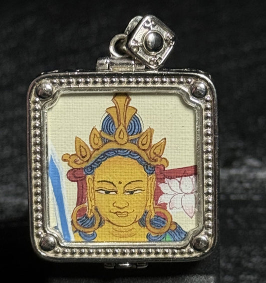 Hand-painted Manjushri Wisdom Buddha pendant, featuring a red & gold Buddha head with 925 silver plating, created in the traditional Tibetan Thangka style. A protector for Rabbit and Gemini zodiac signs.