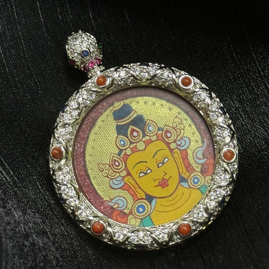 Manjushri Wisdom Buddha pendant in red & gold with decorative copper shell, hand-painted in the Rebgong style, showcasing the double-sided card slot. Comes in a beautiful gift box, perfect for Rabbit and Gemini zodiac wearers.