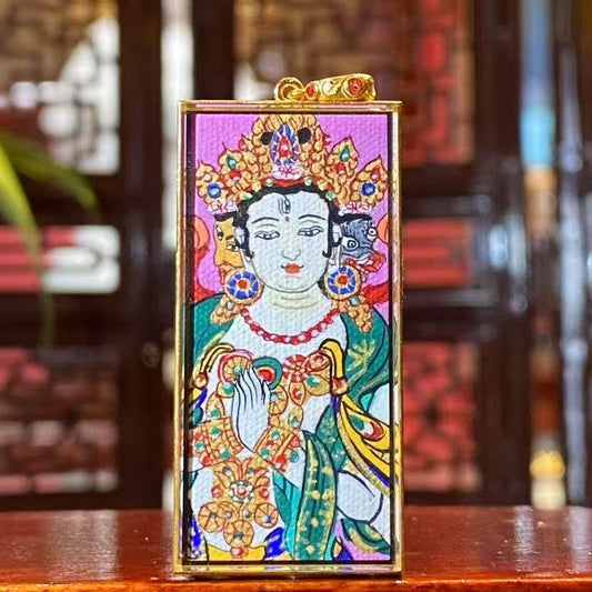 Front view of Marici Devi Thangka pendant, double-sided hand-painted in 18K gold, Rebgong craftsmanship symbolizing protection and clarity