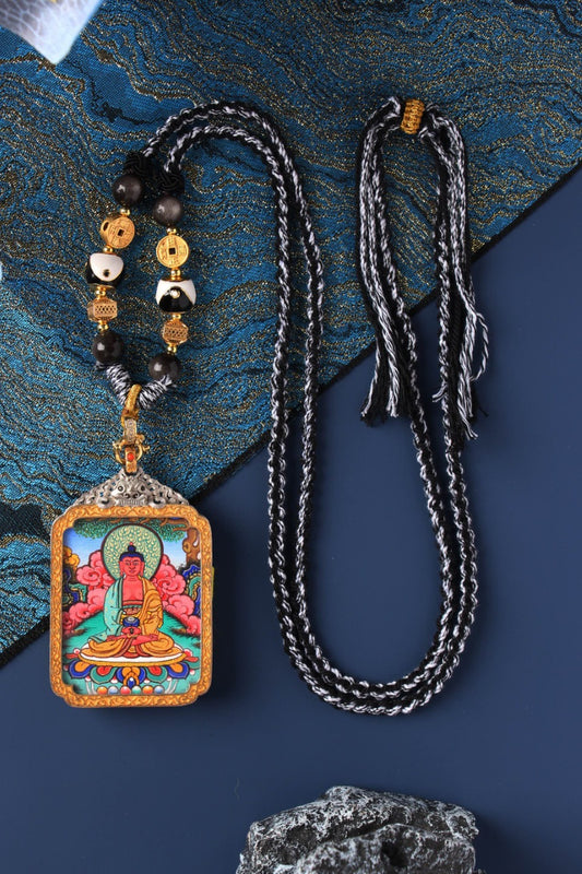 Hand-painted Amitabha Buddha thangka pendant from Rebgong, featuring Western Pure Land Buddha seated in meditation, mineral pigments, high-completion Tibetan Buddhist artwork