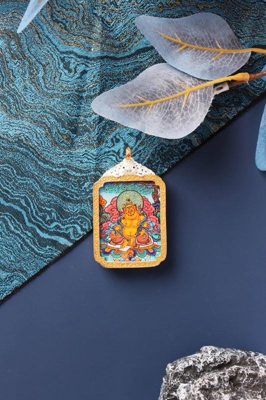 Rebgong high-grade Yellow Jambhala mini thangka pendant painted with natural mineral pigments, silver-plated case, Tibetan wealth deity artwork