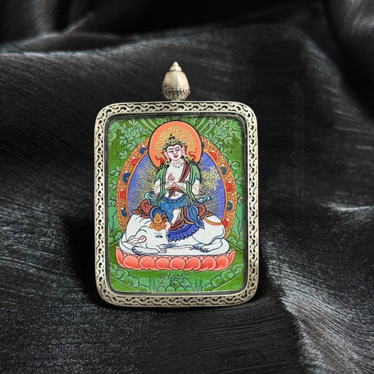 Front view of Samantabhadra Bodhisattva mini thangka pendant showing hand-painted Rebgong thangka artwork with mineral pigments and decorative metal frame