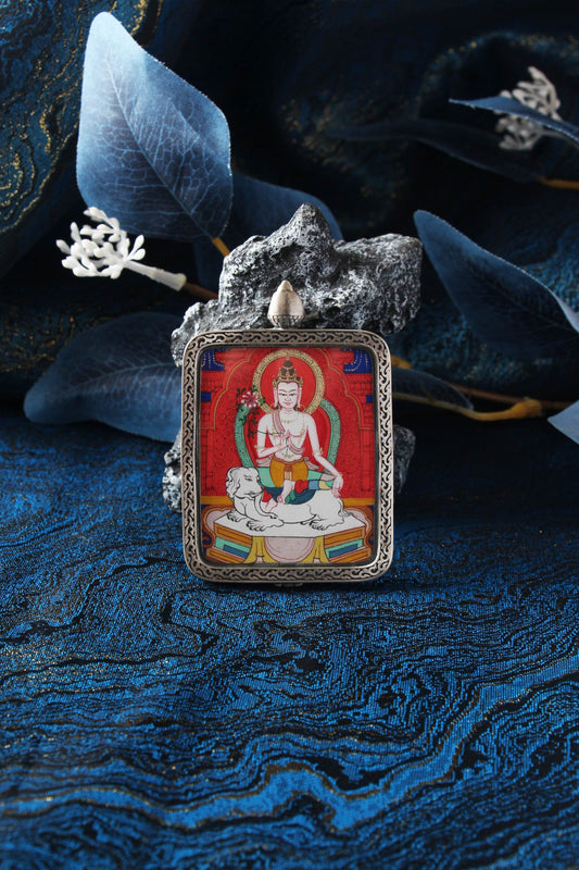 Hand-painted Samantabhadra Bodhisattva mini thangka pendant with red background, seated on a white elephant, set in a sterling silver case