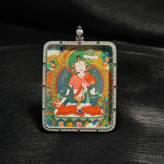 Front view of Sitatapatra White Umbrella Deity mini thangka pendant featuring hand-painted Tibetan mineral pigments, gold detailing, and decorative gemstone pendant frame.