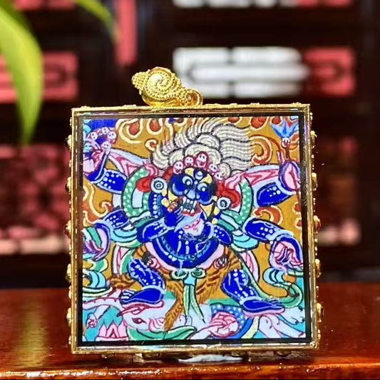 Front view of Six-Armed Mahakala Gau pendant, dual-sided and hand-painted with 18K gold in the Rebgong Tibetan tradition