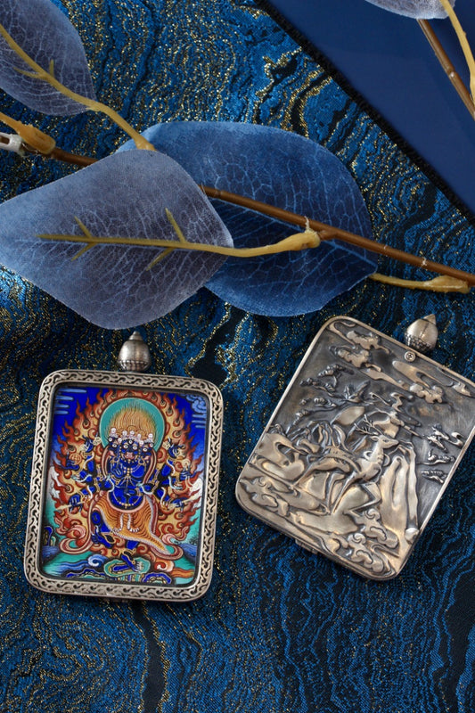 Ucchusma Vajra mini thangka gawu pendant shown with front painting and back of the sterling silver gawu case, highlighting the handcrafted metalwork.