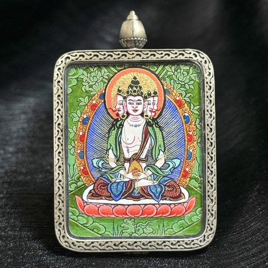 Collector-grade Vairocana Buddha Rebgong Cui Thangka pendant, hand-painted with mineral pigments in the Chinese Intangible Cultural Heritage tradition, set in 925 silver, 3.5 × 4.5 cm