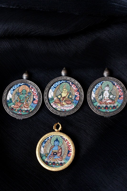 Group display of Vajrasattva mini thangka pendants, fully hand-painted with mineral pigments, Rebgong cloud background, 925 silver and gold-tone fram