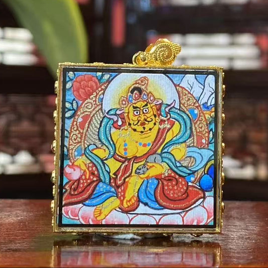 Hand-painted Yellow Jambhala holding the treasure-spitting mongoose, double-sided mini Thangka pendant in an 18K gold Gau box