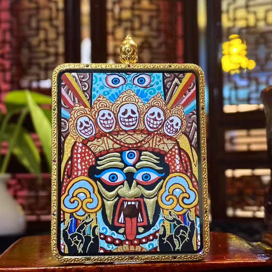 Front view of Zaki Lhamo Tibetan Thangka pendant, double-sided and fully hand-painted in 18K gold, Rebgong style, set in a large traditional Gawu box