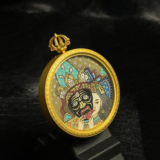 Side view of Zaki Lhamo dual form miniature thangka pendant Tibetan hand painted sacred art