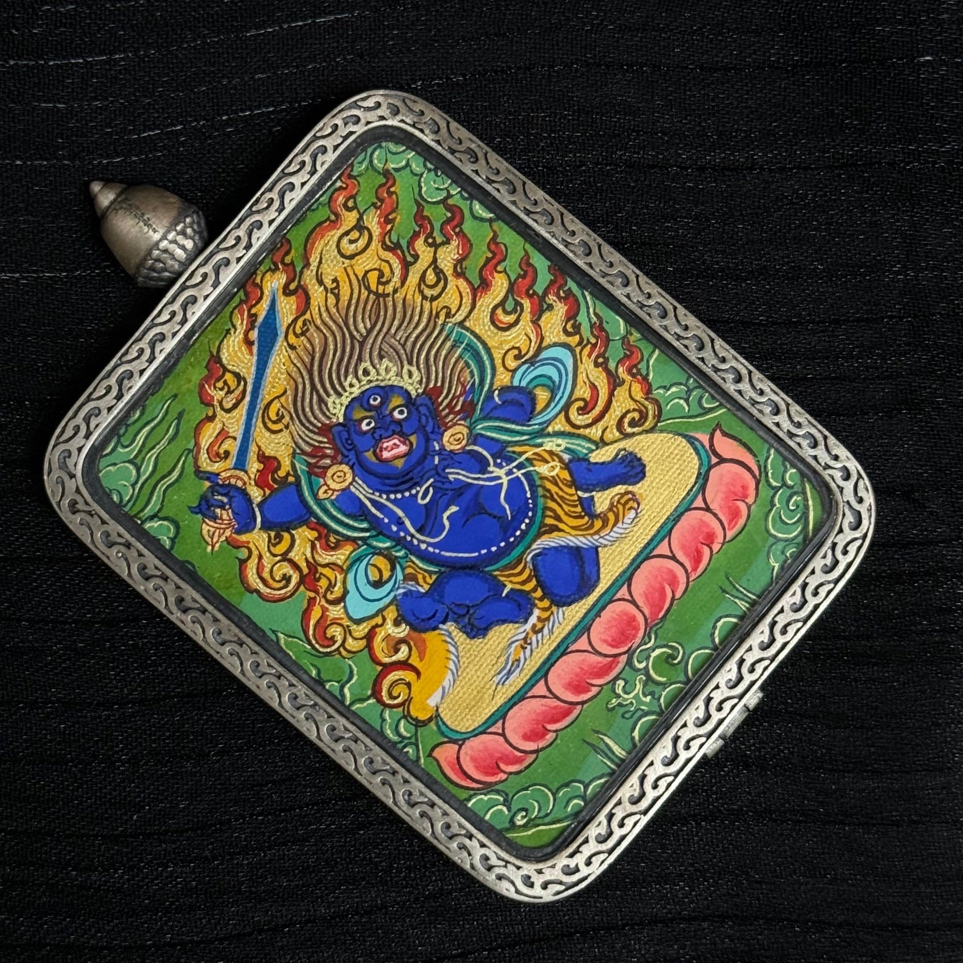 Acala Vidyaraja Thangka displayed with a premium gift box, showing the mini Thangka (3.5 × 4.5 cm), a spiritual guardian for Rooster and Aries, featuring hand-painted mineral pigments and gold detailing.