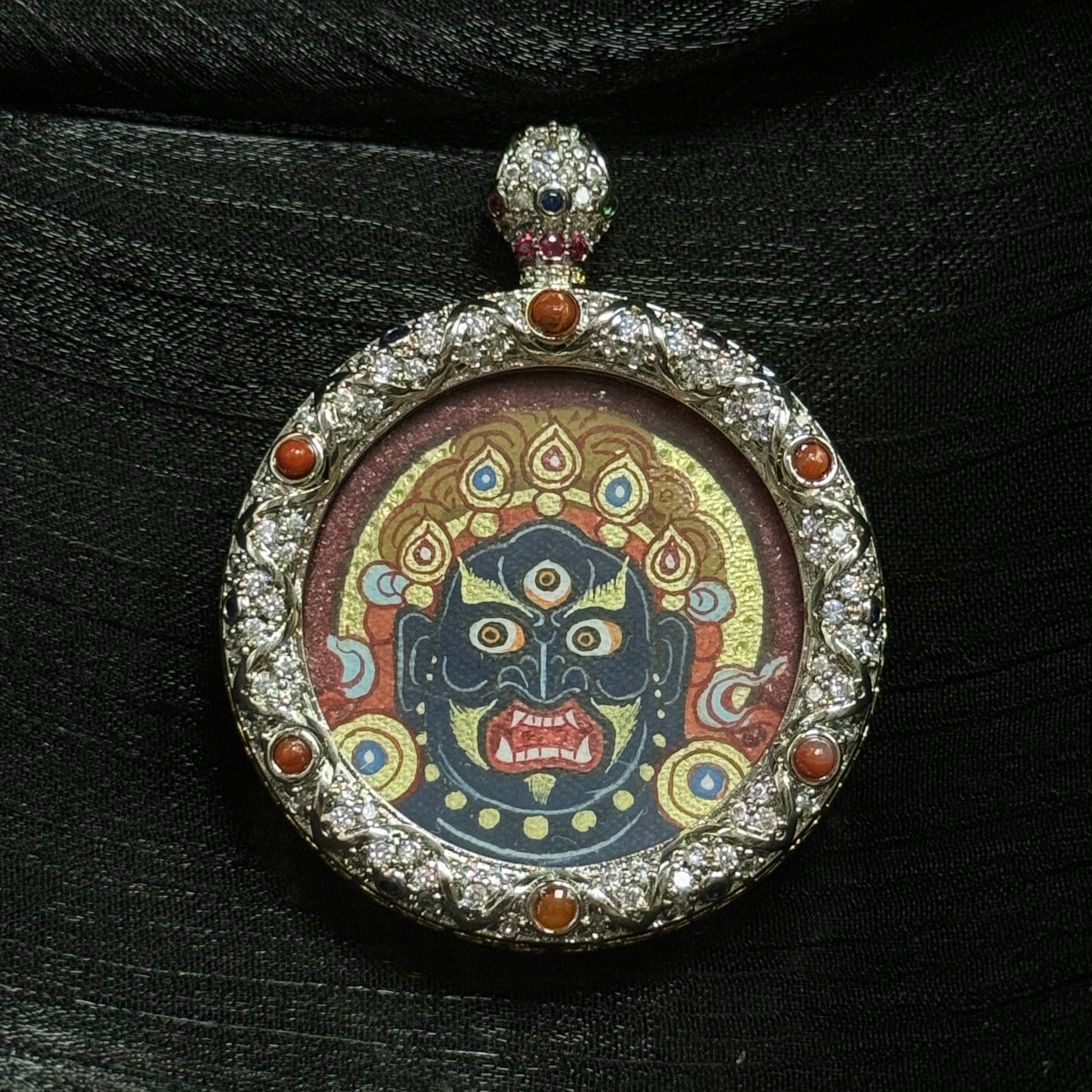 Hand-painted Acalanatha (Fudo Myo-o) round mini thangka pendant with mineral pigments, Rebgong Tibetan style, set in jeweled copper case