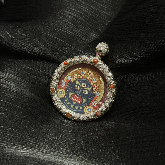 Acalanatha wrathful protector deity miniature thangka painting in circular pendant frame, traditional Tibetan Rebgong mineral pigment artwork