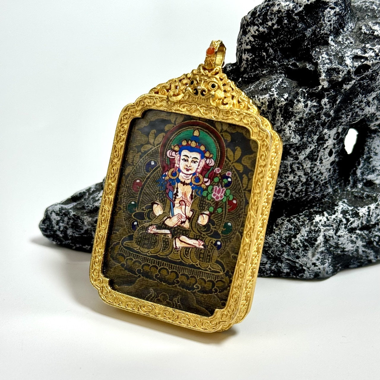 Full view of Akasagarbha Bodhisattva mini thangka pendant highlighting compact proportions, black gold background, hand-painted iconography, and copper pendant structure