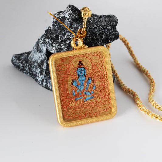 Angled view of the Akashagarbha Bodhisattva mini thangka pendant highlighting the copper case thickness, gold-ground painting surface, and layered mineral pigment texture.