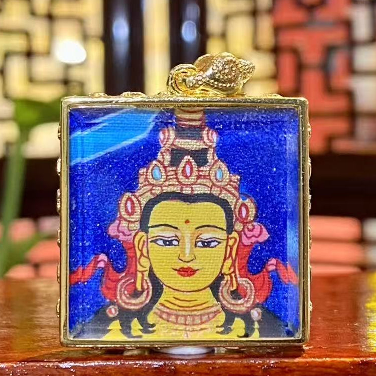 Hand-painted Akashagarbha Bodhisattva mini thangka pendant in a gold-plated Tibetan Gawu box, symbol of wisdom and prosperity