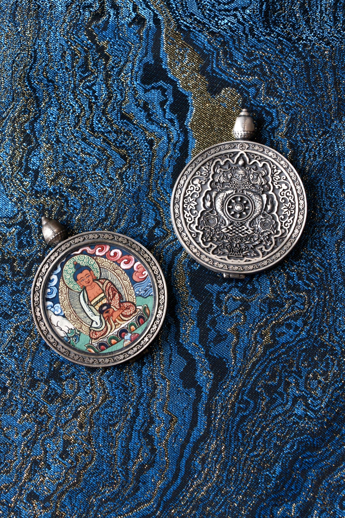 Double-sided Amitabha Buddha Thangka pendant showing hand-painted front and engraved silver back, Rebgong Tibetan art style, 925 silver case