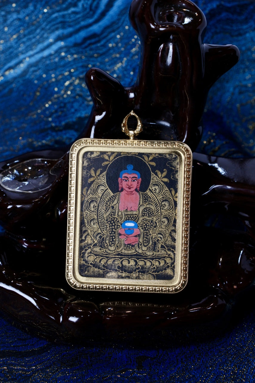 Front view of Amitabha Buddha mini thangka pendant in Nepalese black-gold style, hand-painted artwork set in a gold-tone titanium steel protective case