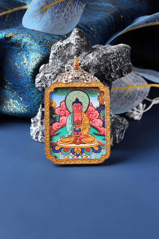 Close-up of Amitabha Buddha thangka pendant, Western Pure Land Buddha with halo and lotus throne, painted by Rebgong lama artist using natural mineral pigments