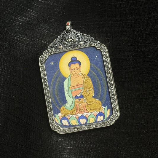 Close-up detail of Amitabha Buddha thangka painting showing layered mineral pigments, fine line work, and traditional Tibetan color composition.