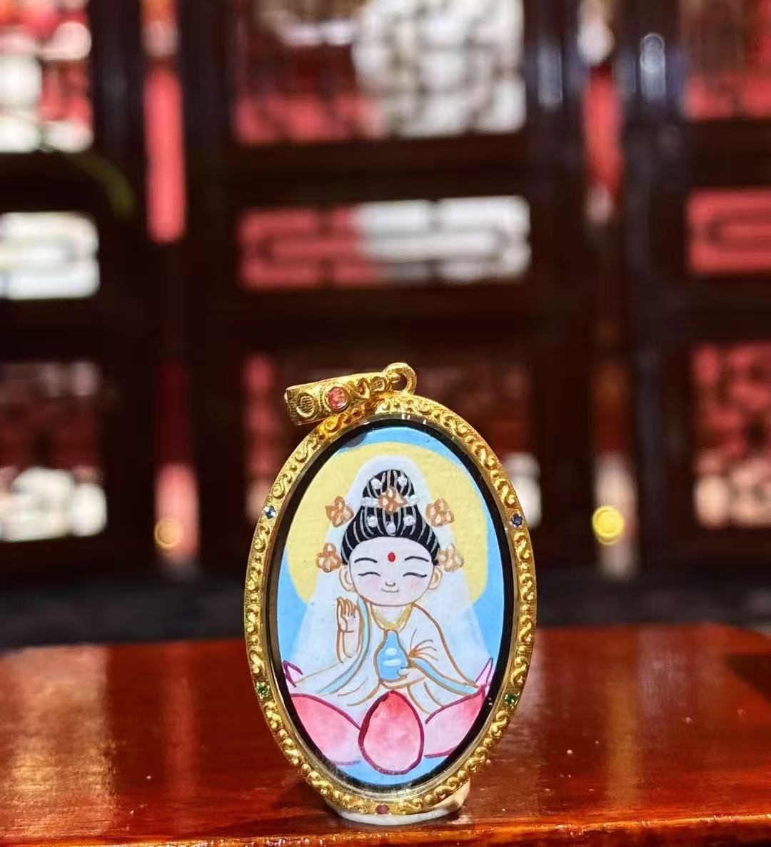 Back view of a double-sided Tibetan Ghau Thangka pendant featuring Avalokiteshvara (Guanyin), hand-painted in 18K gold