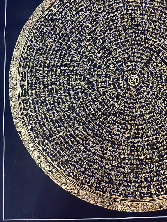 Close-up detail of gold script Mani Mantra on a Black Thangka mandala, showing intricate hand-painted Tibetan mantra lines and decorative outer border