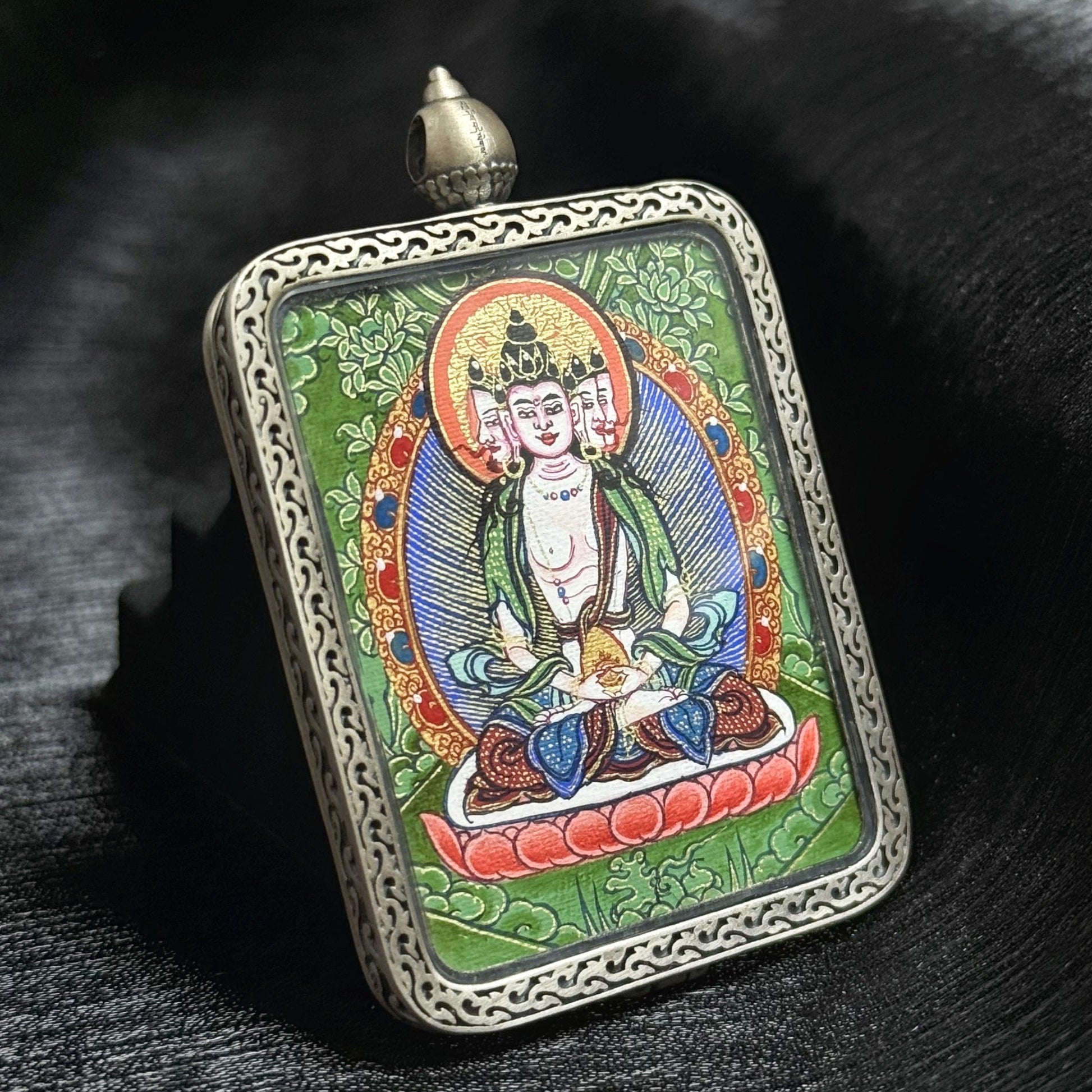 Rebgong Cui Thangka Vairocana Buddha pendant mounted in 925 silver, presented with gift box and certificate of authenticity, Chinese Intangible Cultural Heritage Buddhist art