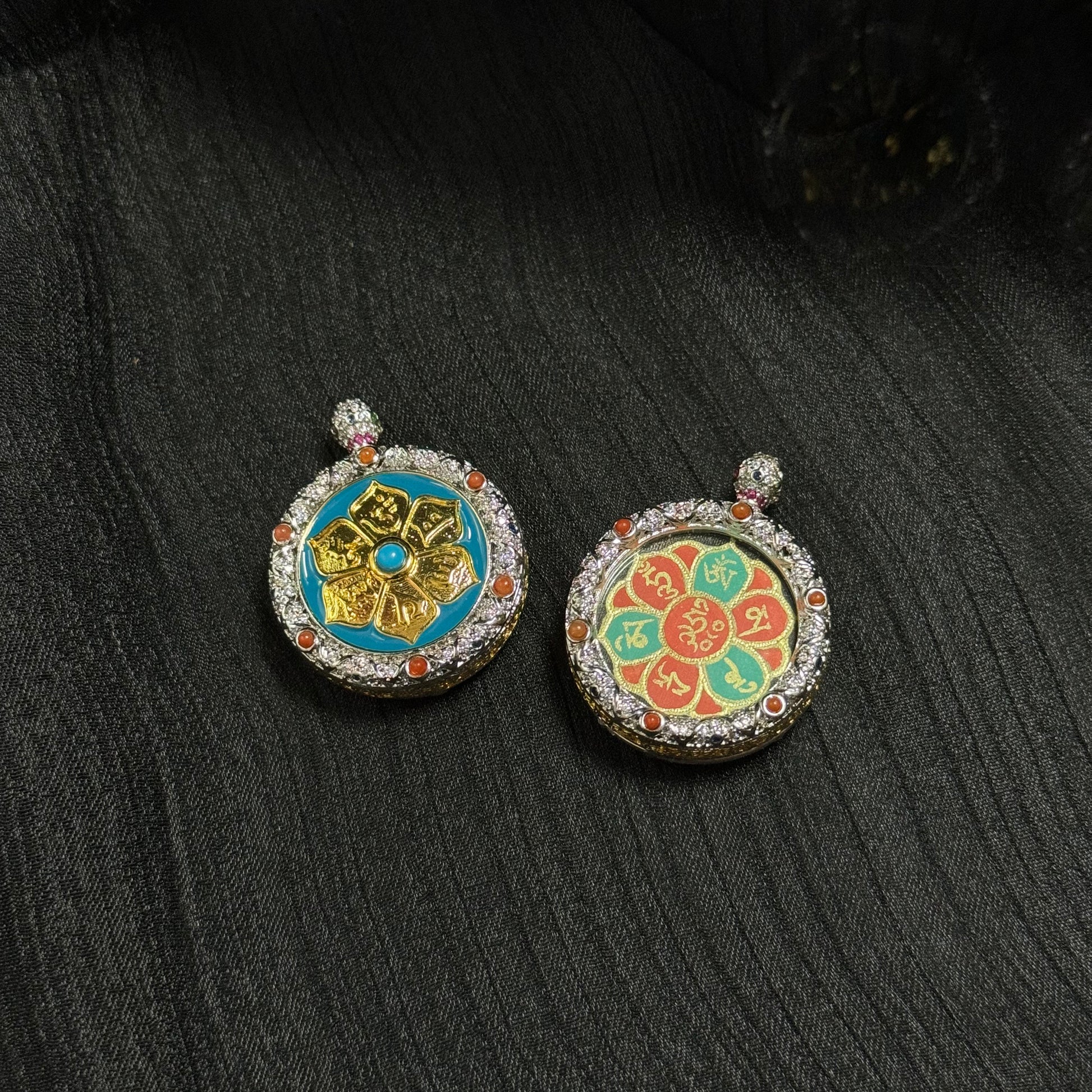 Double-sided miniature thangka pendant showing Avalokiteshvara Mani mantra lotus painting on one side and decorative mantra lotus design on the reverse, framed in a jeweled copper case.