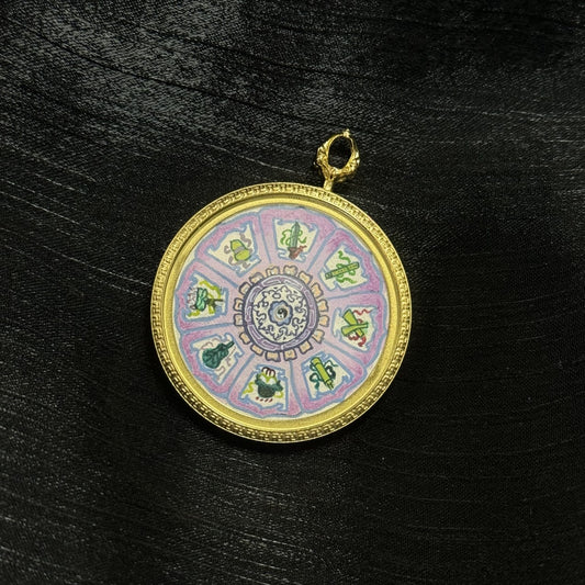 Close-up of the Eight Immortals Bagua pendant highlighting fine line motifs, pastel segment borders, the central rosette pattern, and the textured gold-tone rim.