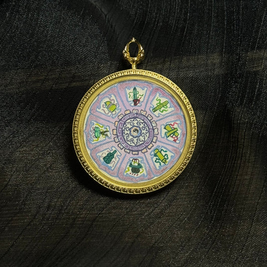 Hand-painted miniature thangka pendant showing the symbolic objects of the Eight Immortals including sword, gourd, fan, flute, flower basket, lotus, fish drum, and jade tablet.