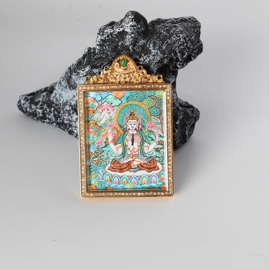 Centered front view of a Four-Armed Avalokiteshvara Buddhist pendant, representing compassion, healing, and family harmony.