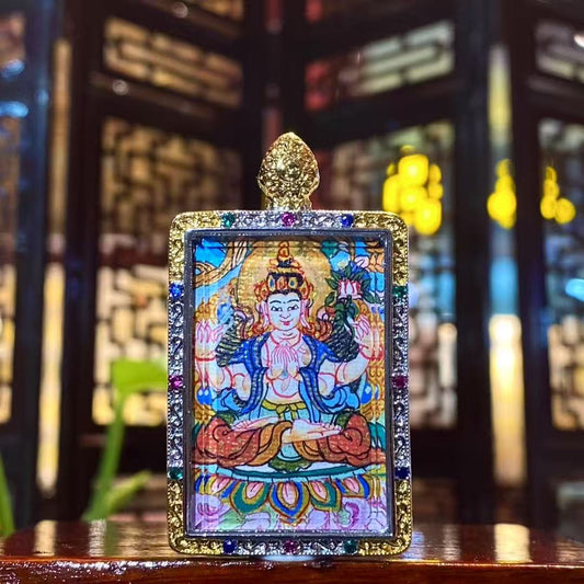 Hand-painted Four-Armed Avalokiteshvara mini thangka pendant in a gilded copper Ghau box, front view