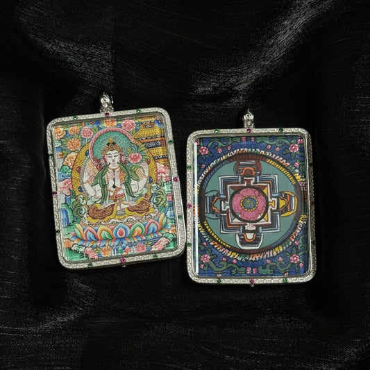 Front and back view of a Four-Armed Avalokiteshvara mini thangka pendant, showing the hand-painted Avalokiteshvara seated on a lotus throne and the sacred mandala on the reverse side, set in a square 925 sterling silver case with colored gemstone details.