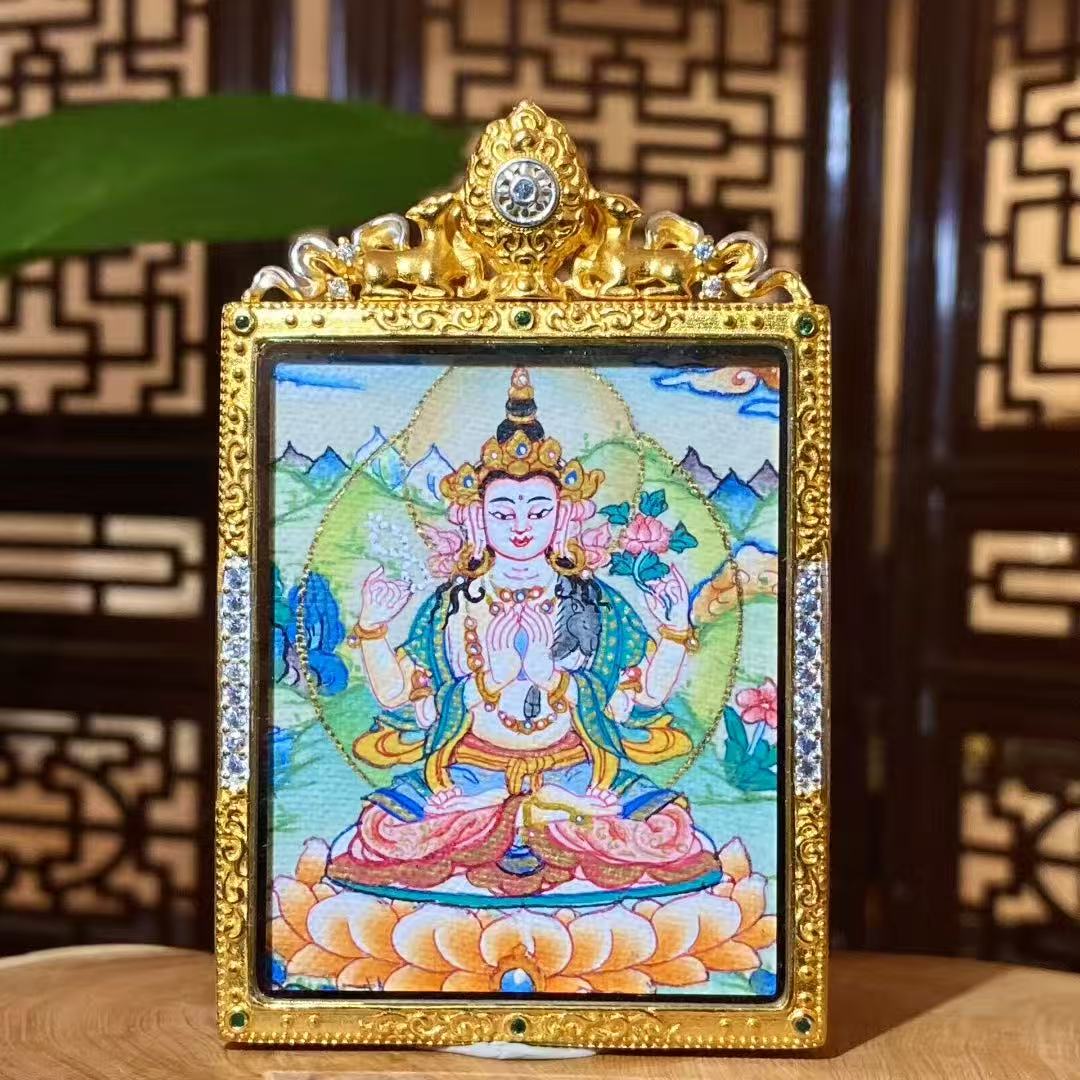 Hand-painted Four-Armed Avalokiteshvara thangka pendant in a gilded copper Ghau box, front view