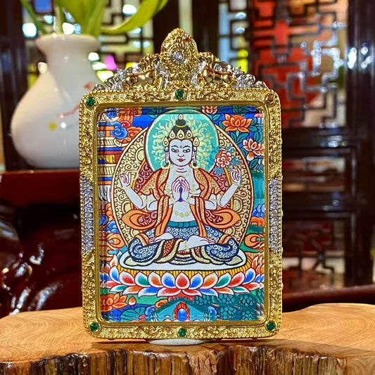 Hand-painted Four-Armed Avalokiteshvara thangka pendant in a gilded copper Ghau box, front view