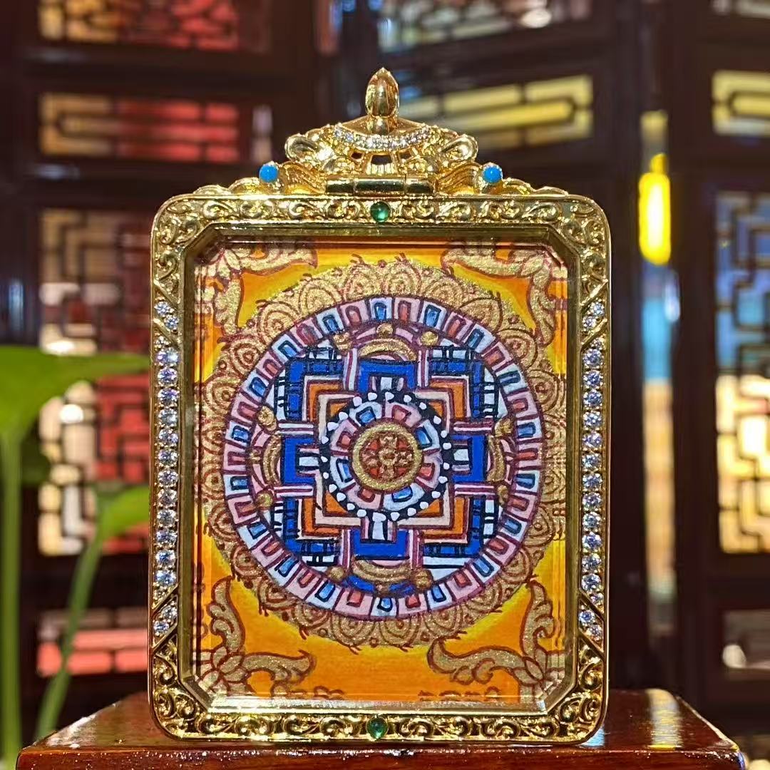 Back view of double-sided thangka pendant featuring a Four-Directional Mandala inside a gold-plated Tibetan Gawu box, symbol of balance and harmony